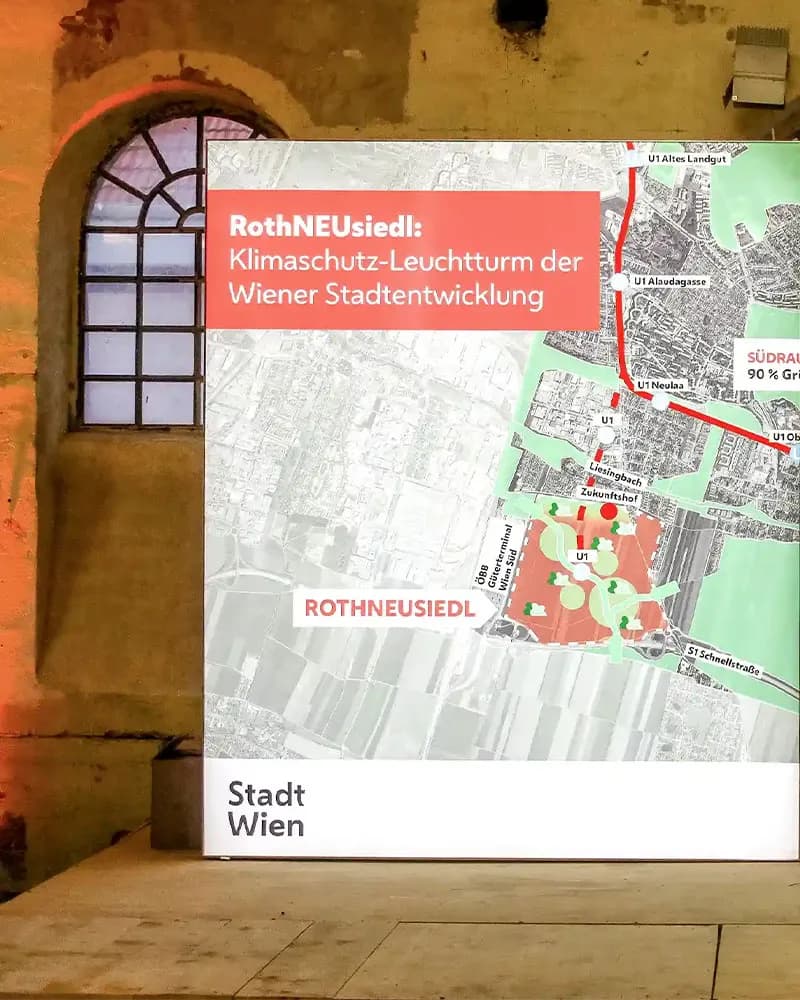 Das Logo leitet sich aus der Grundfläche des Projektgebiets ab – „NEU" bewusst hervorgehoben, das Morgenrot Wiens als visuelle Linie.